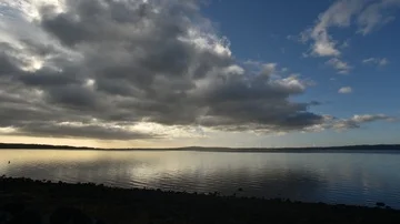 Time Lapse Sunrise, clouds movement over lake Stock Footage 85564523