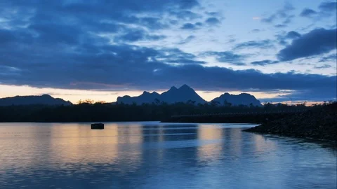 Time Lapse of Sunrise with Colorful dramatic sky over the lake Stock Footage 100637827