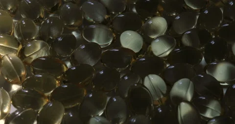 Time lapse sunrise drop shadow on a medical pills Stock Footage 129555201