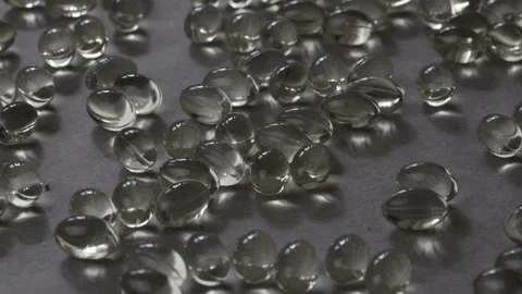 Time lapse sunrise drop shadow on a medical pills Stock Footage 129963209