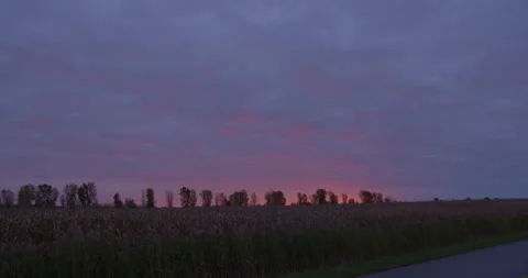 Time lapse of sunrise during a cloudy day in rural area Stock Footage 131019668