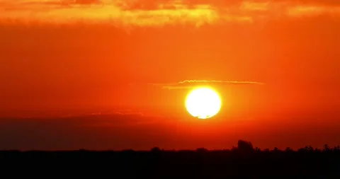Time lapse of a sunrise in a field Stock Footage 175390143