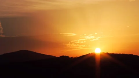 A time lapse of a sunrise. Stock Footage 88321006