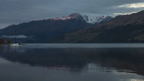 Time Lapse - Sunrise at Lake Wakatipu with Tooth Peaks visible. Stock Footage