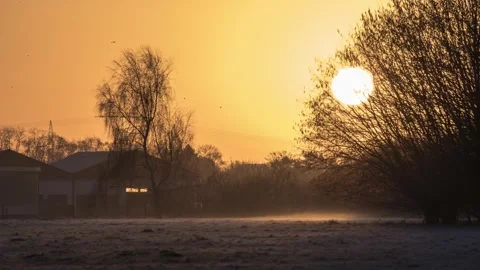 Time-lapse of a sunrise, misty Stock Footage 289313416