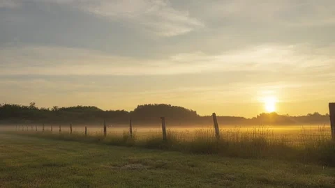 Time-lapse of a sunrise, misty 스톡 동영상 289314738
