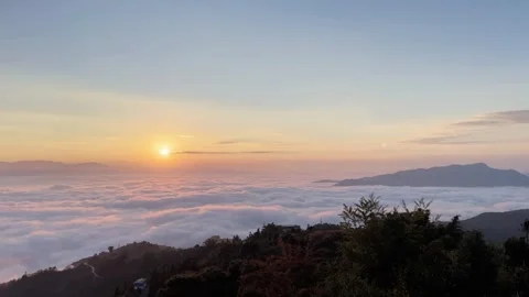 Time-lapse Sunrise Over a Fast-Moving Sea of Clouds with Cinematic Wind Effe Stock Footage 330161821