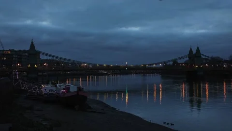 Time lapse of sunrise over Hammersmith Bridge, London.  Zoom in Stock Footage 166951946