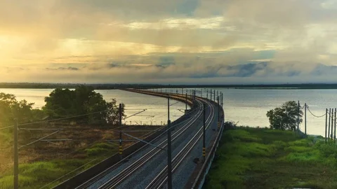 Time Lapse : Sunrise Scenery Of Floating Railway Of Taiping Town.HD Stock Footage 130164337