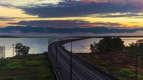 Time Lapse : Sunrise Scenery Of Floating Railway Of Taiping Town.HD Stock Footage 130164410