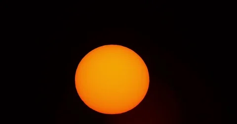 Time Lapse Sunrise shot with a solar filter. Video stock 83403192