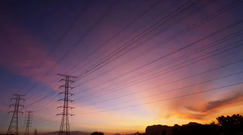 Time lapse of sunrise through flowing cloud waves Stock Footage 35111517