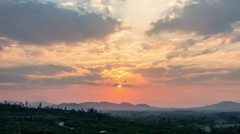 Time lapse of a sunset above the hills Stock Footage 64579984