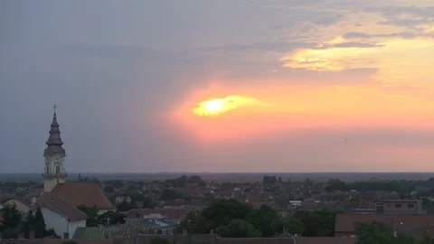 Time lapse of sunset above a small European city Stockbeeldmateriaal 93273977