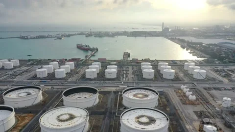 Time lapse sunset. Aerial view of oil refinery power plant  with storage tank Stock Footage 132019600