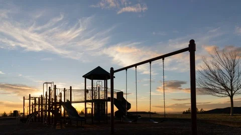 Time lapse of sunset and clouds over playground in Altamont Park Happy Valley OR Stock Footage 72396454