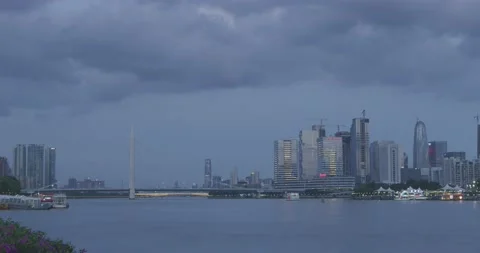 Time Lapse sunset and lights on at city downtown riverside Stock Footage 159778710