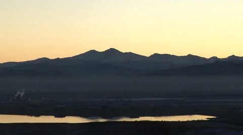Time Lapse of Sunset and Moonset over Long;' Peak Stock Footage 54733938