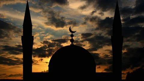 Time-lapse Sunset and Mosque Silhouette.Birds Flying Around the Mosque. 04 Stock Footage 237650756