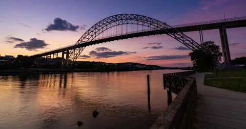 Time Lapse of a sunset at an arch Bridge in southern Norway Video stock 157156617