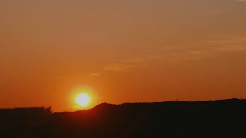 Time lapse of sunset on the backdrop of the sand pit Stock Footage 106581793