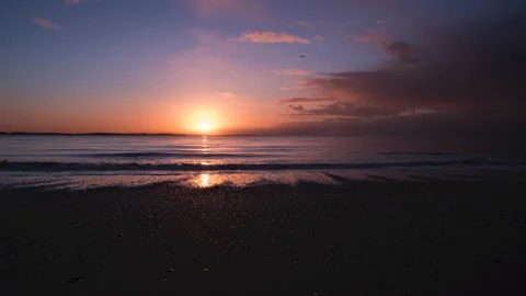 Time lapse of a sunset at the beach Stock Footage 168320745