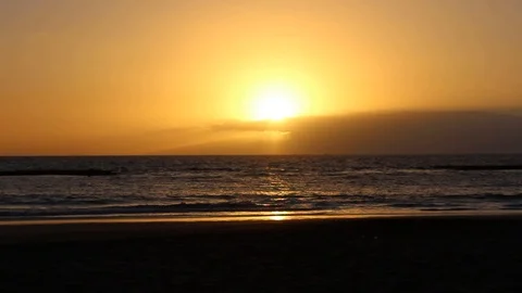 Time lapse at sunset on the beach. HD video with people silhouette Stock Footage 98564061