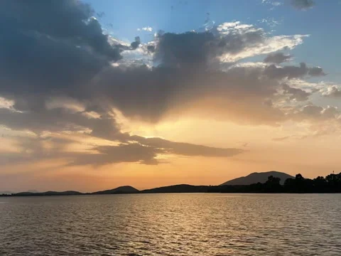 Time lapse of sunset at the beach:, sun, sea water, clouds Stock Footage 248016404