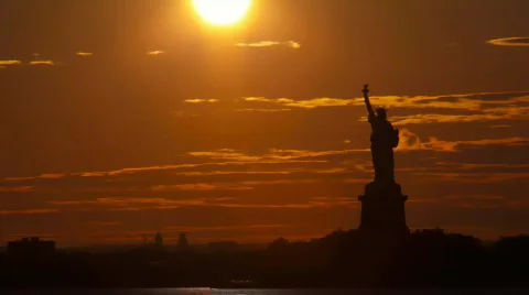 Time lapse - Sunset behind Statue of Liberty Stock Footage 481221