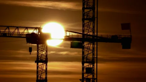 Time lapse of sunset. build develop growth background. construction cranes Stock Footage 64541265