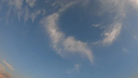 Time lapse at sunset with clouds in the blue sky Stock Footage 168846337