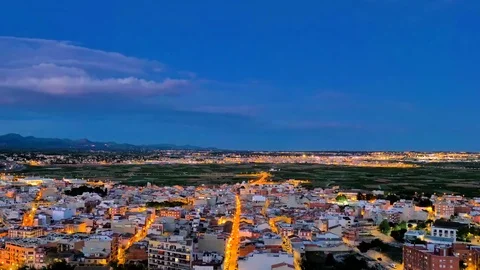 Time lapse of sunset clouds at high speed over Mediterranean village Stock Footage 124232374
