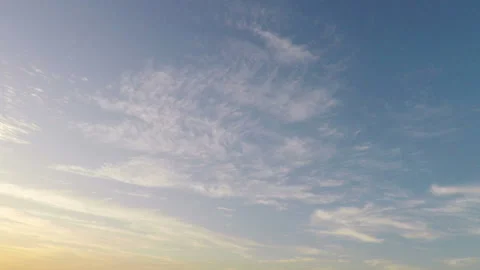 Time-lapse of sunset clouds moving over the sky 스톡 동영상 97734182