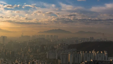 Time Lapse sunset clouds at Seoul City Skyline in Seoul  South Korea Stock Footage 104667928