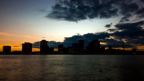 Time-lapse of Sunset with Cloudy Sky over New Orleans Skyline Stock Footage 219349502