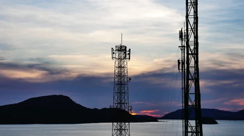 Time Lapse Sunset with Communications Towers over bay Stock Footage 57169328