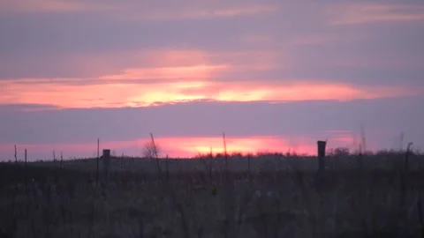 Time lapse of sunset with evening glow in the countryside Stock Footage 237078437