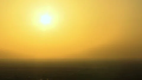 Time lapse of a sunset falling beyond the horizon Video stock 140509876