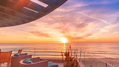 Time lapse of sunset at getaway vacation coastal home Stock Footage 111941845