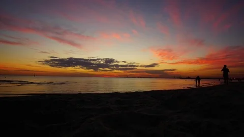 Time lapse of sunset hour in st. kilda melbourne beach Stock-Footage 73308140