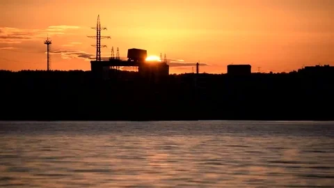 Time lapse of sunset with hydroelectric power plant Stock Footage 69251836