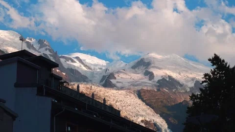 Time-lapse Sunset light illuminates snowy Mont Blanc mountain peak glacier .. Stock Footage 341415039