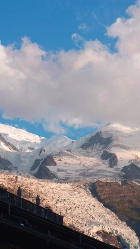 Time-lapse Sunset light illuminates snowy Mont Blanc mountain peak glacier .. Stock Footage 341571303