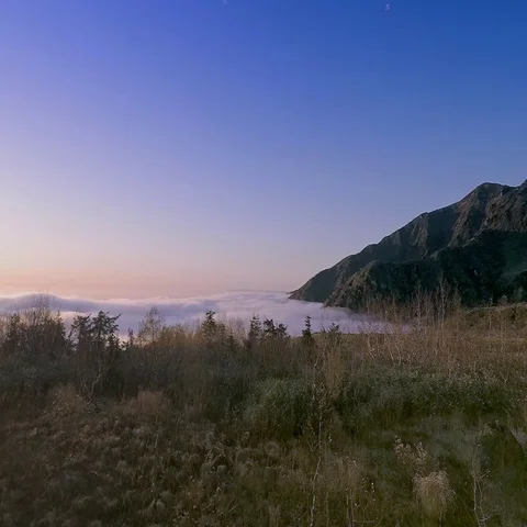 Time lapse of sunset misty clouds moving. Stock Footage 69429939