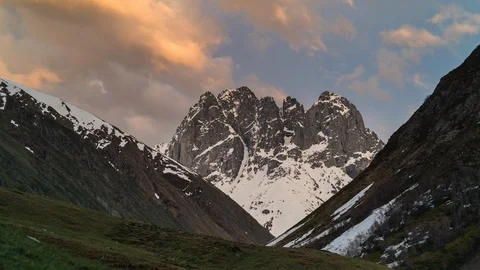 Time-lapse of sunset in mountain valley. moving clouds. Stock Footage 114400719