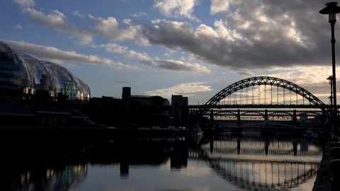 Time lapse sunset Newcastle upon Tyne bridges across the Tyne river UK 4K Stock Footage 105351114