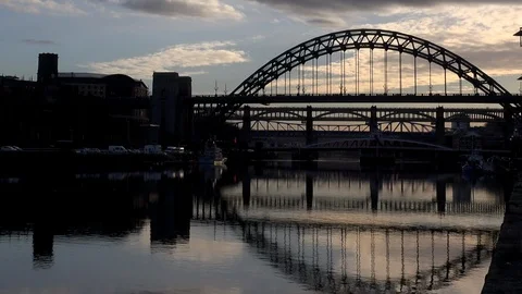 Time lapse sunset Newcastle upon Tyne bridges across the Tyne river UK 4K Stock Footage 105351309