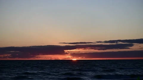 Time lapse of a sunset over the baltic sea Video stock 142085599