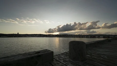 Time lapse of sunset over the bay. 스톡 동영상 111825349