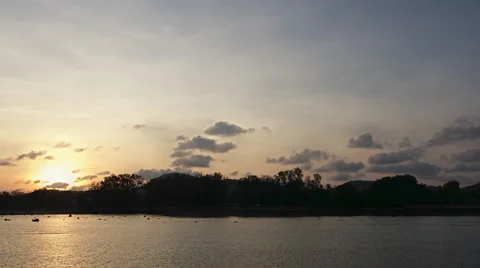 Time Lapse Sunset over beach with clouds Stock Footage 56476434
